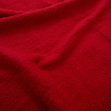 Close-up of red fouta with a textured surface